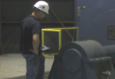 Worker Reviewing Machine